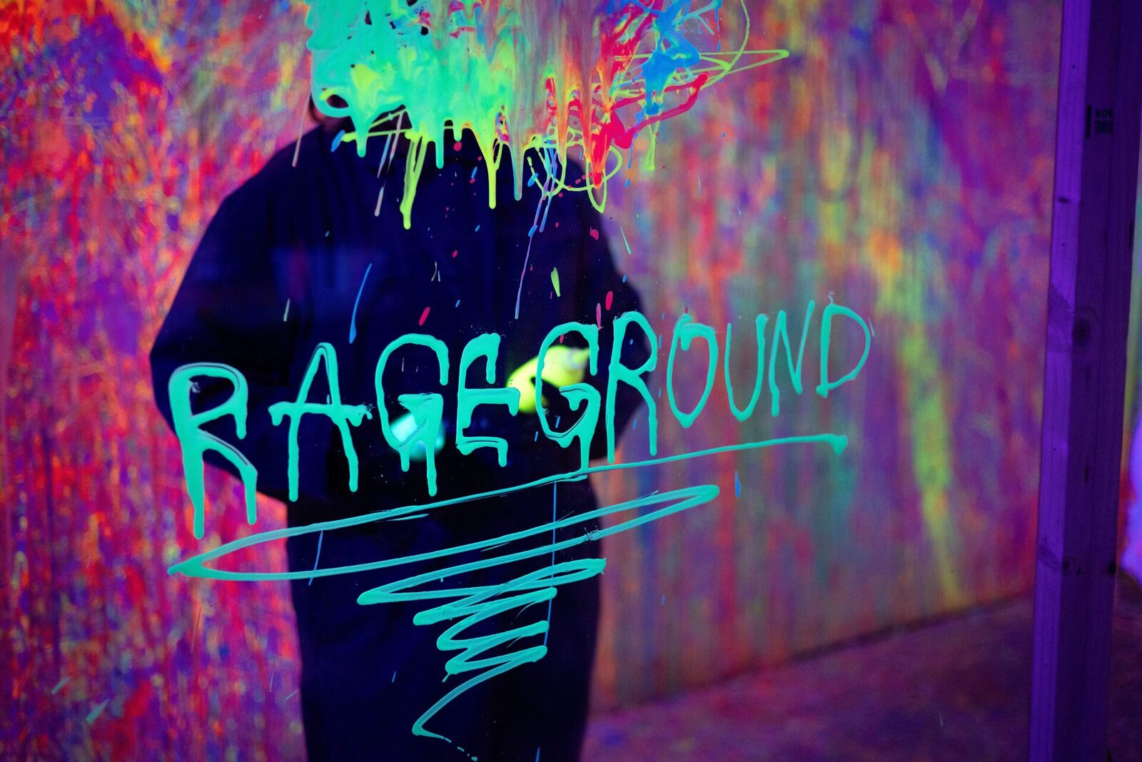 Black light paint splatter room at Rage Ground